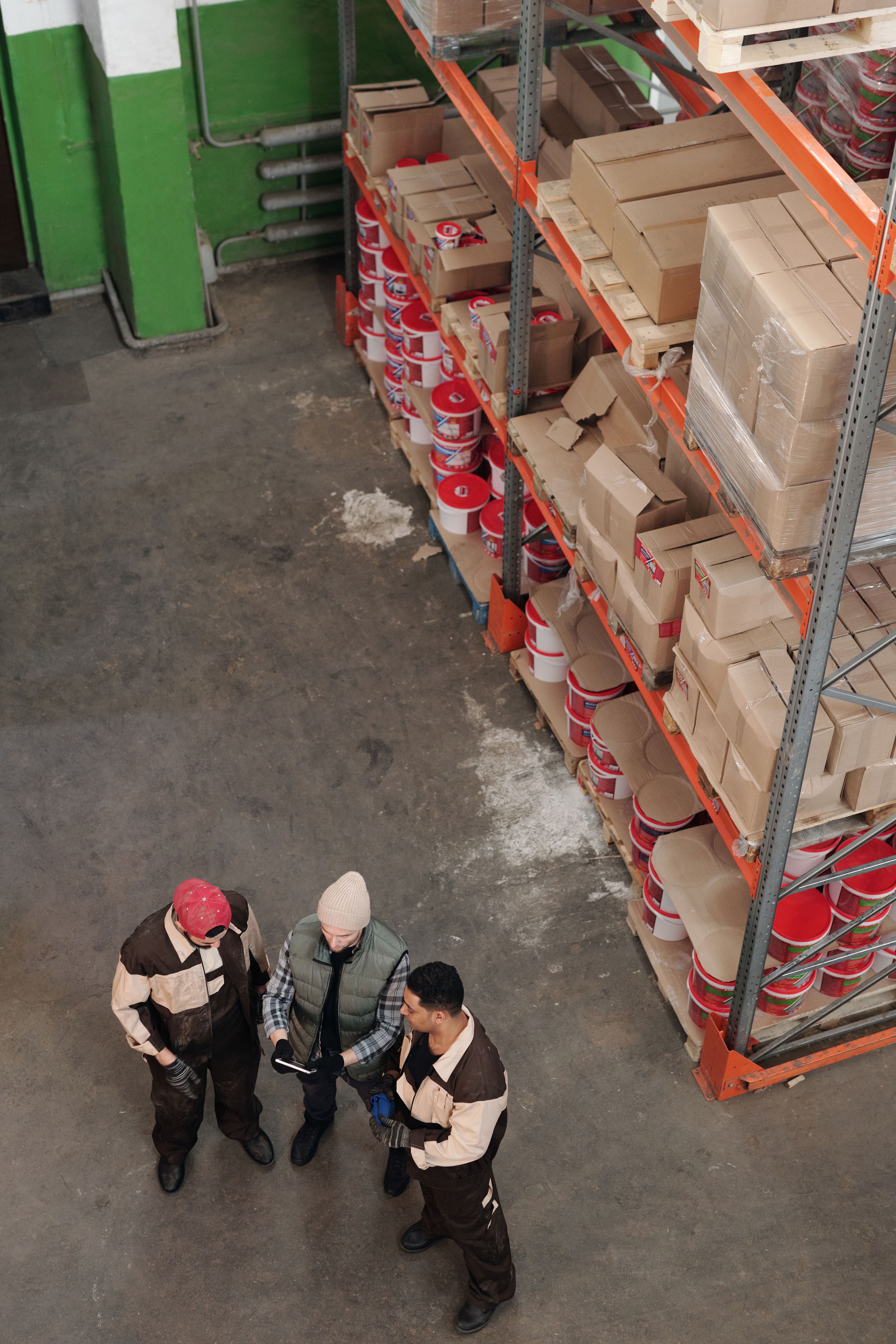 Warehouse colleagues reviewing information together